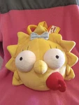 Collectible 1997 Plush Backpack Bag With Maggie Simpson's Head From The Simpsons. Fixed Price $59.99.