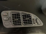 1995-1999 Mitsubishi Eclipse Center Dash Air Vent With Hazard Defrost Switch Oem. Fixed Price $50.00.